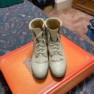 Justin lace up boots. They are a size 5.5 in youth which is an 8 in women’s.
